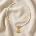 Pearl and Gold Charm Necklace