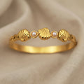 Gold Shell and Pearl Bangle Bracelets
