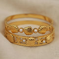 Gold Shell and Pearl Bangle Bracelets